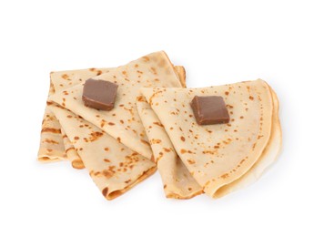 Photo of Tasty crepes with chocolate butter isolated on white