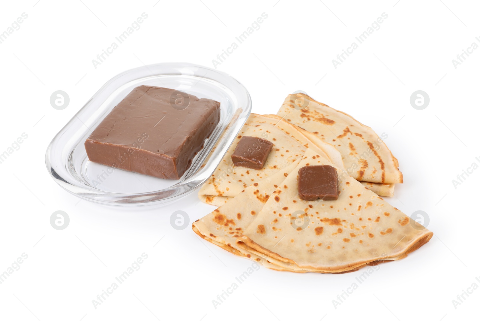 Photo of Tasty crepes with chocolate butter isolated on white