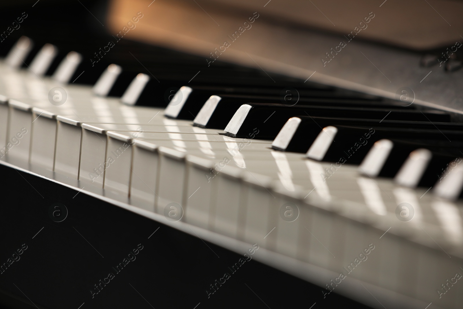 Photo of Beautiful piano as background, closeup view. Festive music