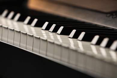 Photo of Beautiful piano as background, closeup view. Festive music