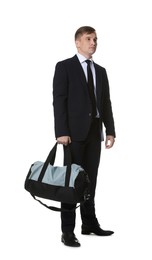 Photo of Young man in suit with gym bag on white background