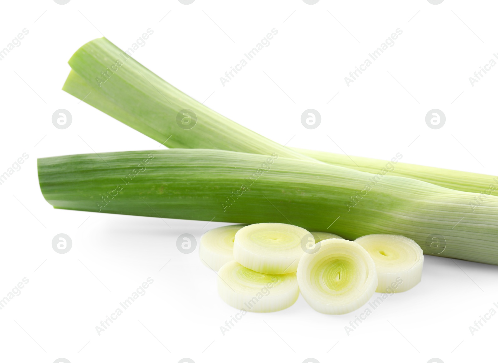 Photo of Whole and cut leeks isolated on white