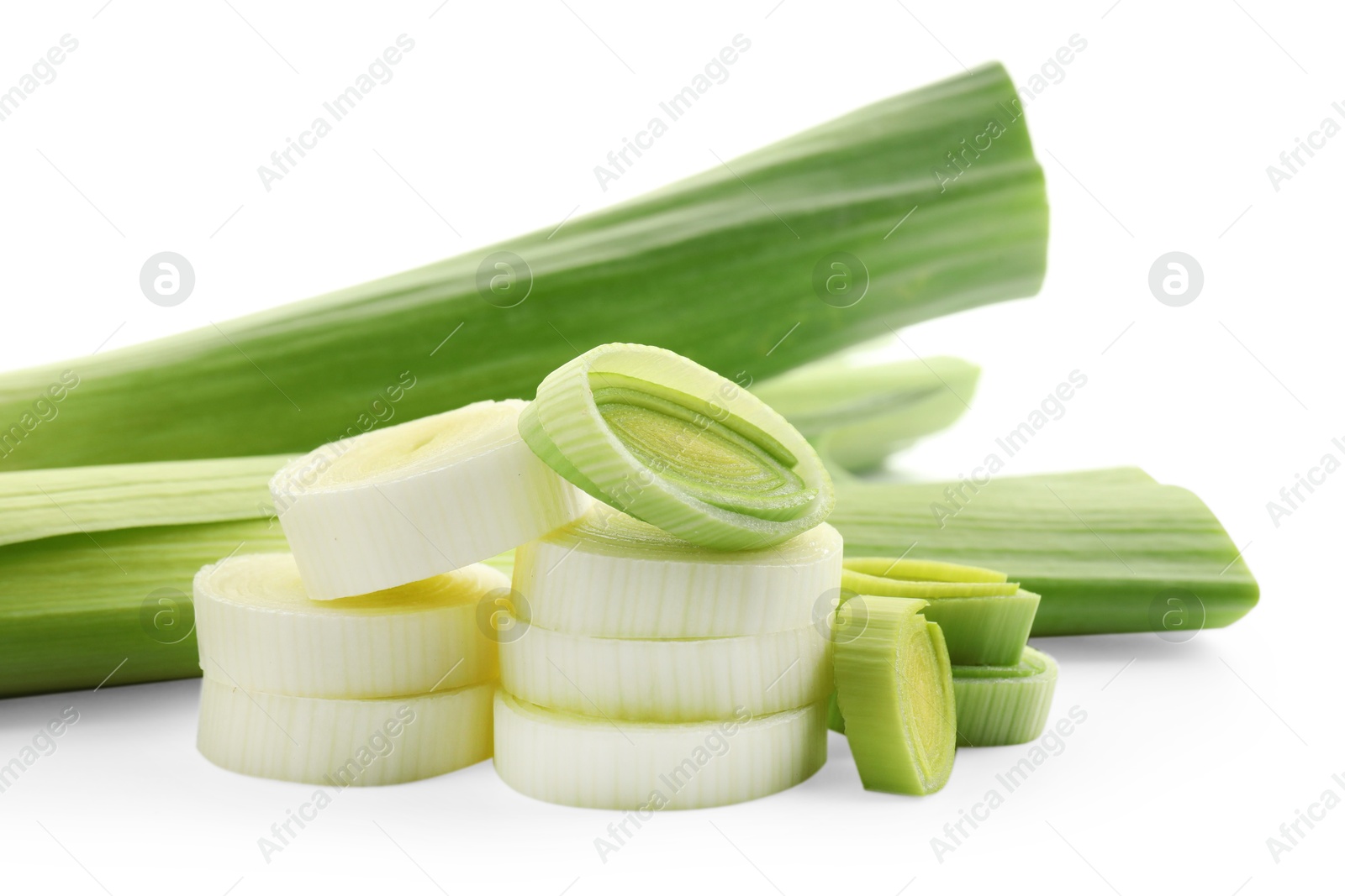 Photo of Whole and cut leeks isolated on white