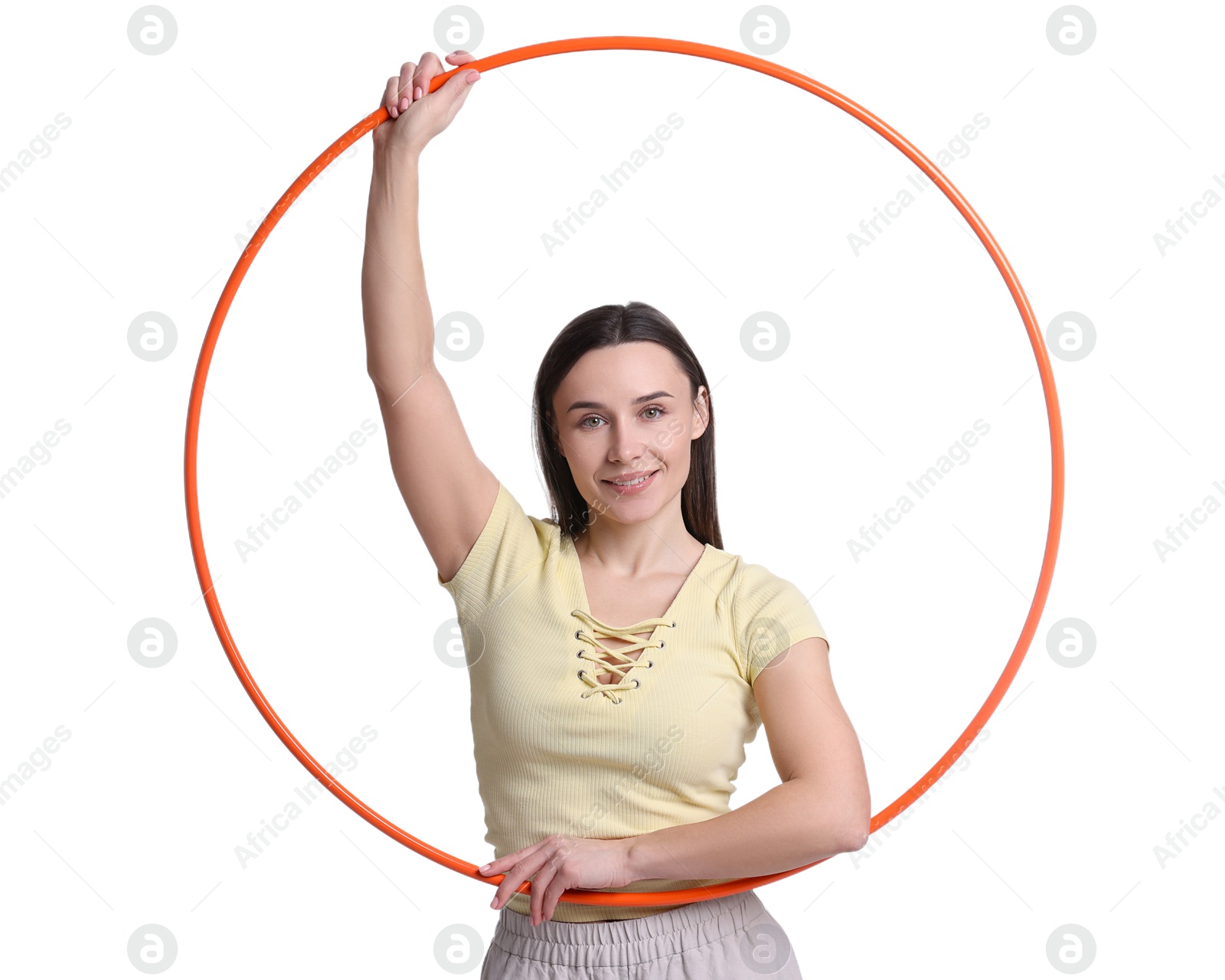 Photo of Smiling woman with hula hoop on white background