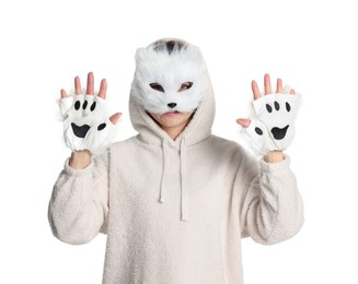 Photo of Quadrobics. Woman wearing cat mask and gloves on white background