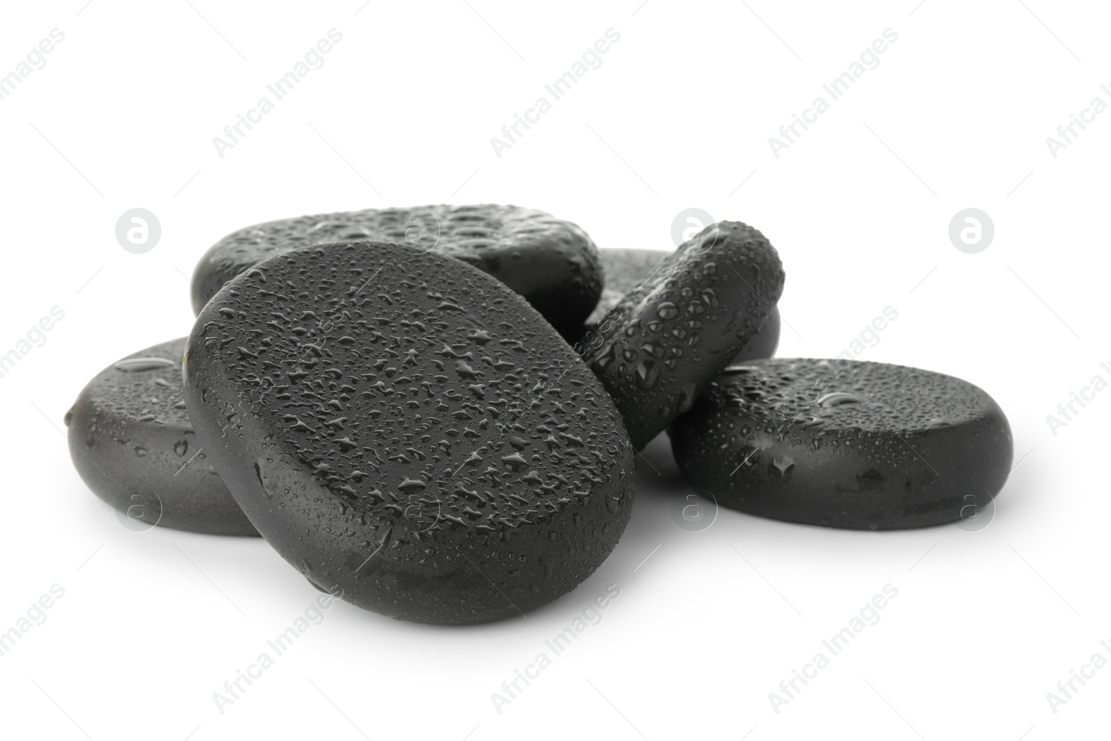 Photo of Wet spa stones isolated on white. Zen and harmony