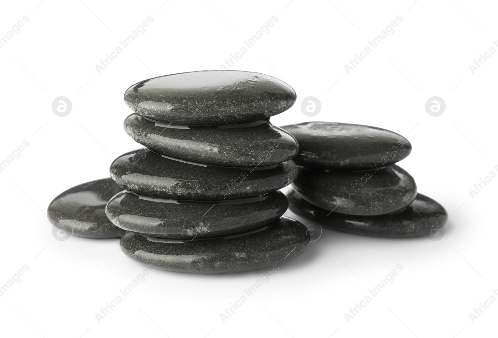 Photo of Wet spa stones isolated on white. Zen and harmony