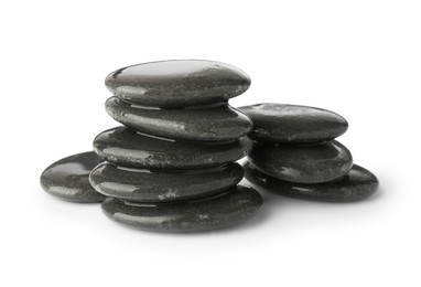 Photo of Wet spa stones isolated on white. Zen and harmony