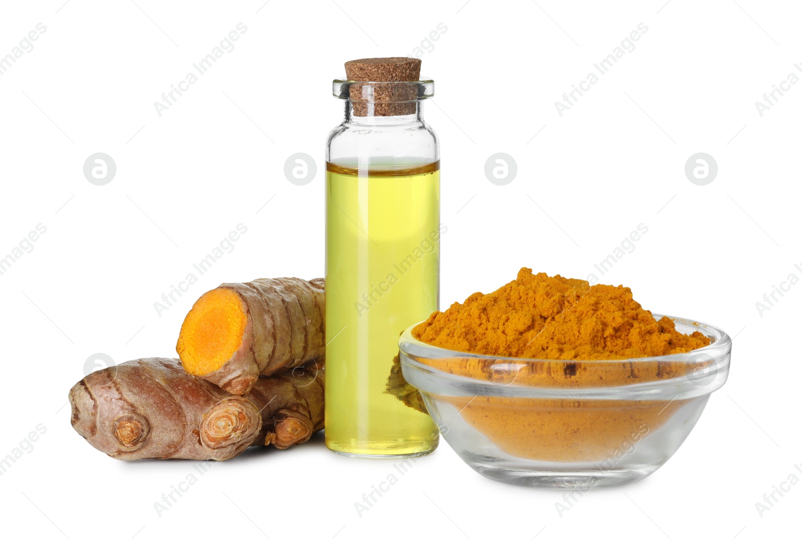 Photo of Bottle of turmeric essential oil, powder and raw roots isolated on white