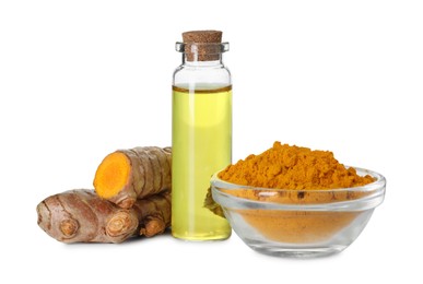 Photo of Bottle of turmeric essential oil, powder and raw roots isolated on white