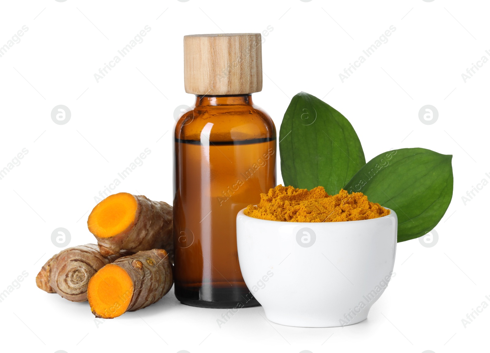 Photo of Bottle of turmeric essential oil, powder, raw roots and leaves isolated on white