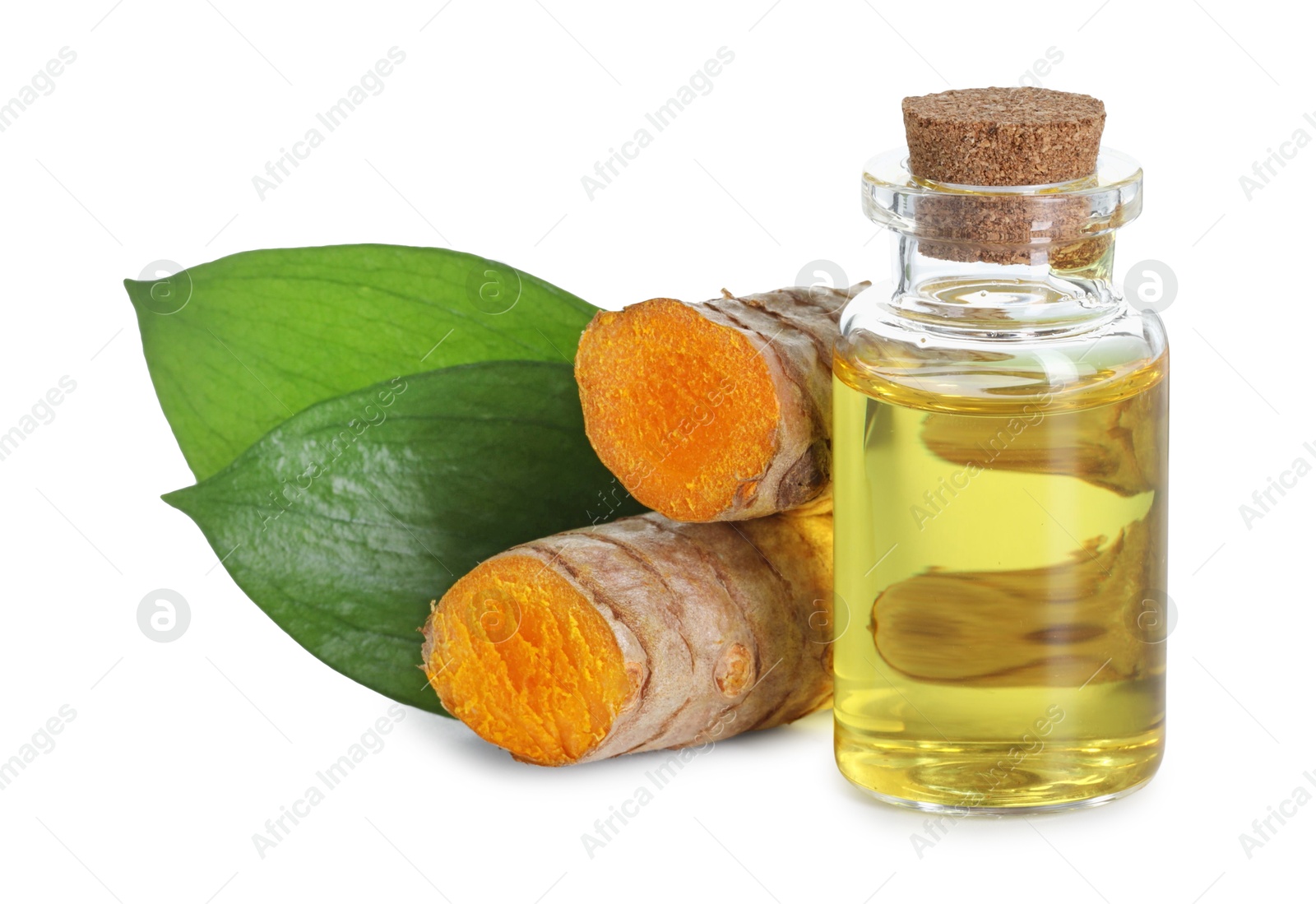 Photo of Bottle of turmeric essential oil, raw roots and leaves isolated on white