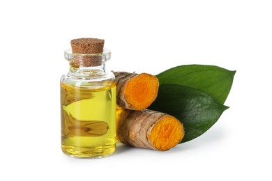 Photo of Bottle of turmeric essential oil, raw roots and leaves isolated on white