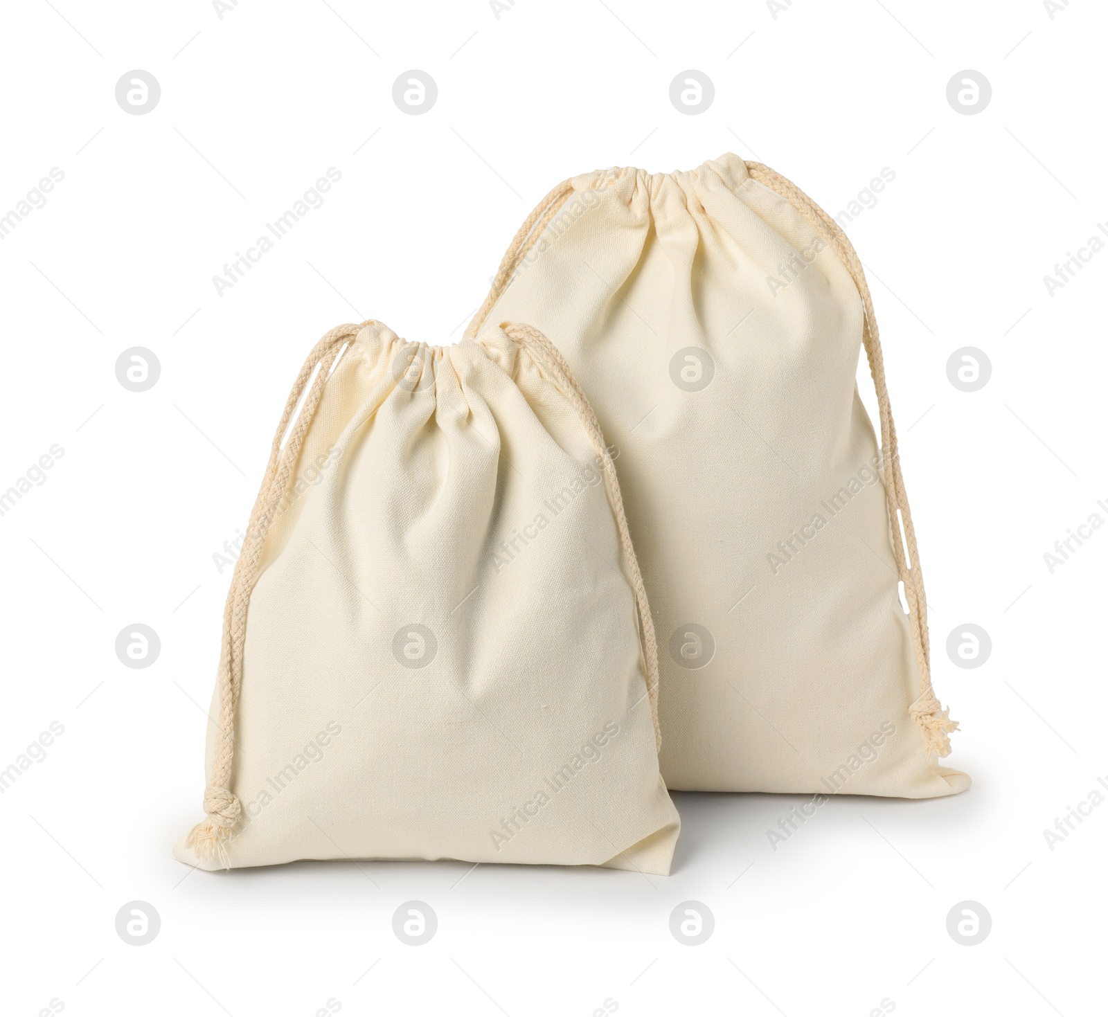 Photo of Two cotton bags with ties isolated on white