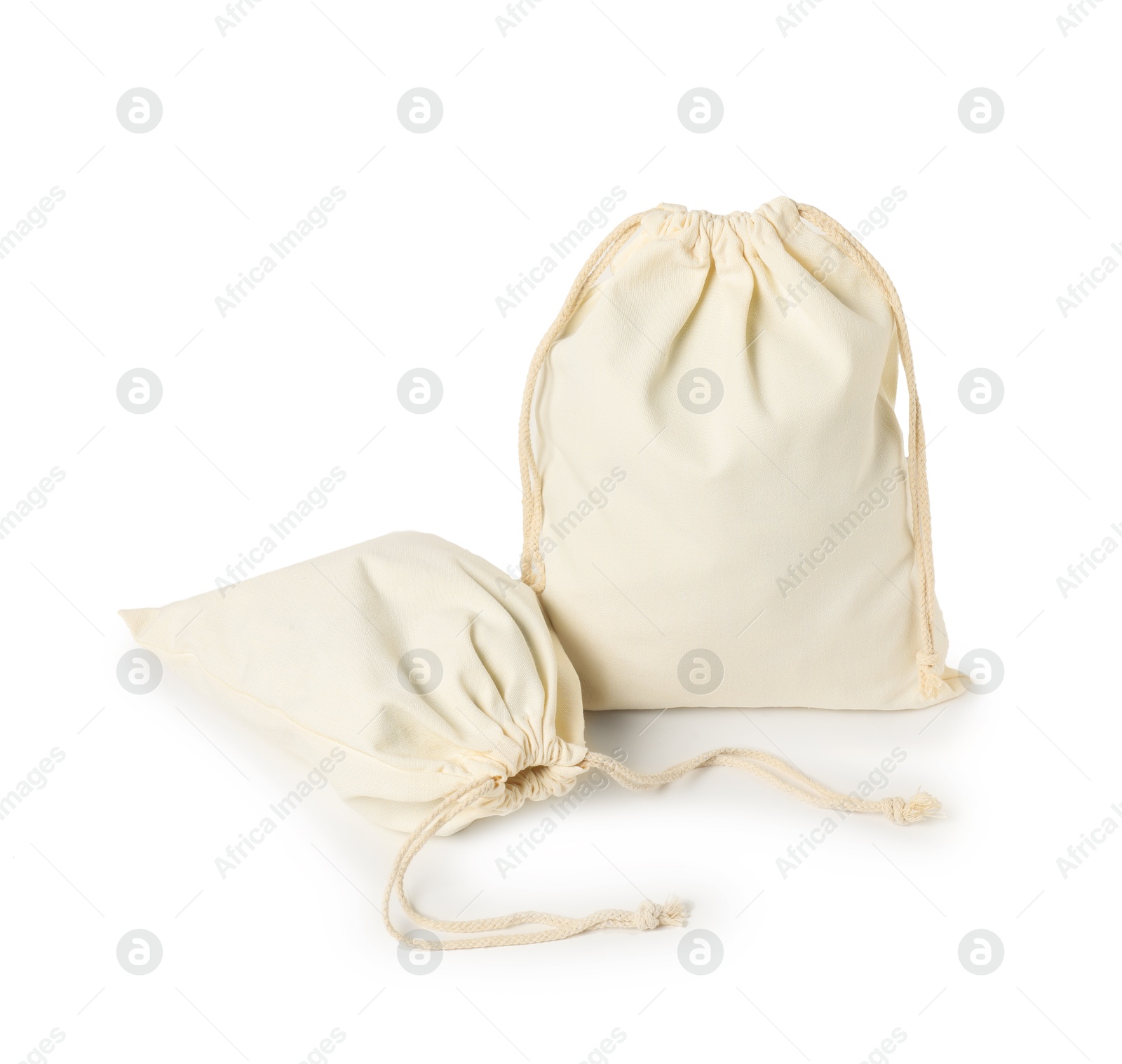 Photo of Two cotton bags with ties isolated on white