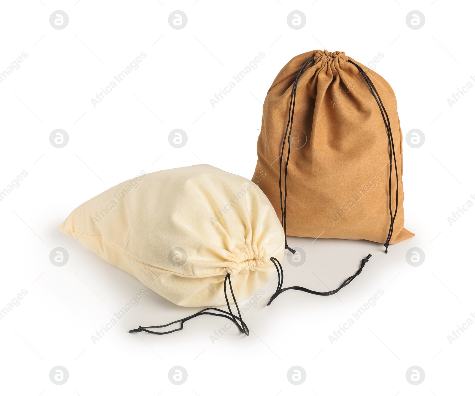 Photo of Two cotton bags with ties isolated on white