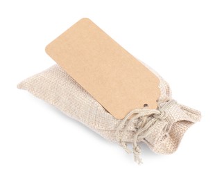 Photo of Burlap bag with tag isolated on white