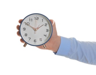 Photo of Man with alarm clock on white background, closeup