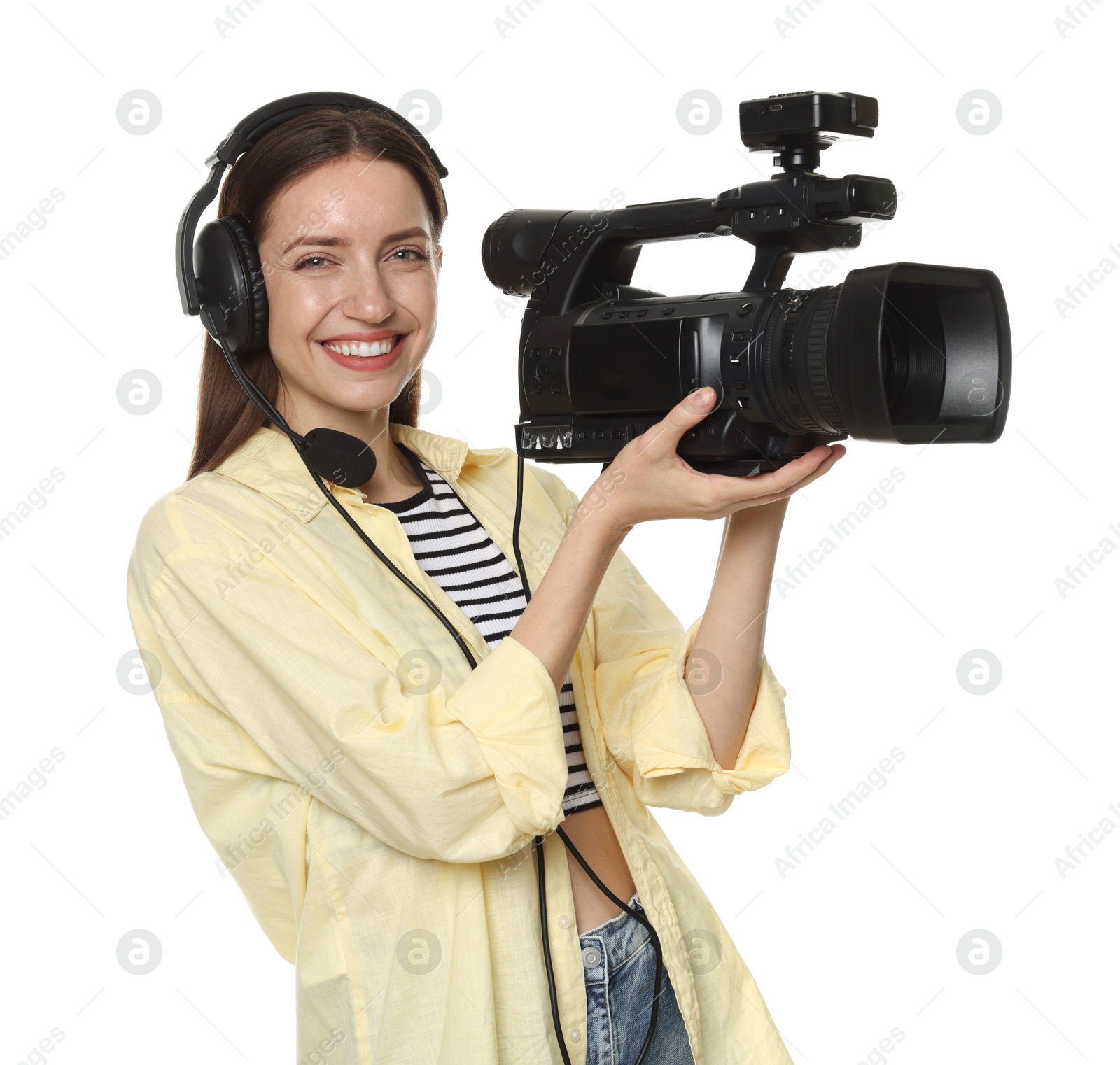 Photo of Happy woman with professional video camera and headset on white background