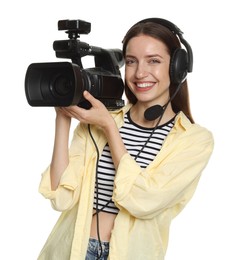 Photo of Happy woman with professional video camera and headset on white background