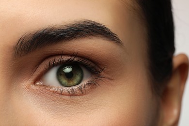 Image of Closeup view of woman with green eyes