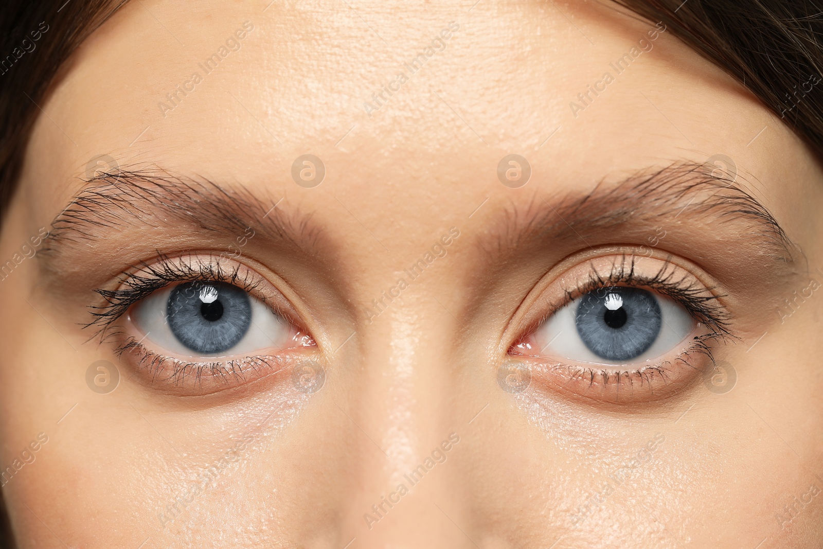 Image of Closeup view of woman with blue eyes