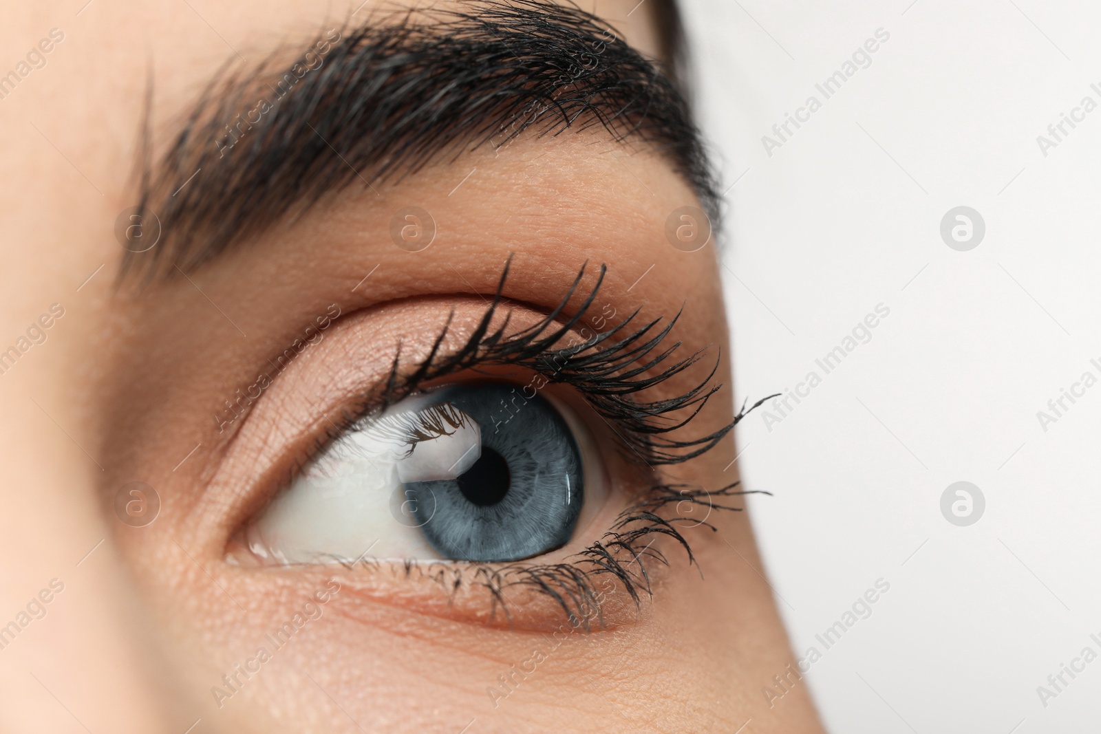 Image of Closeup view of woman with blue eyes