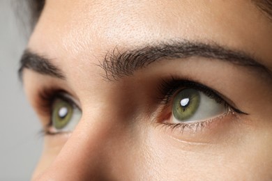 Image of Closeup view of woman with green eyes