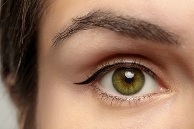 Image of Closeup view of woman with green eyes