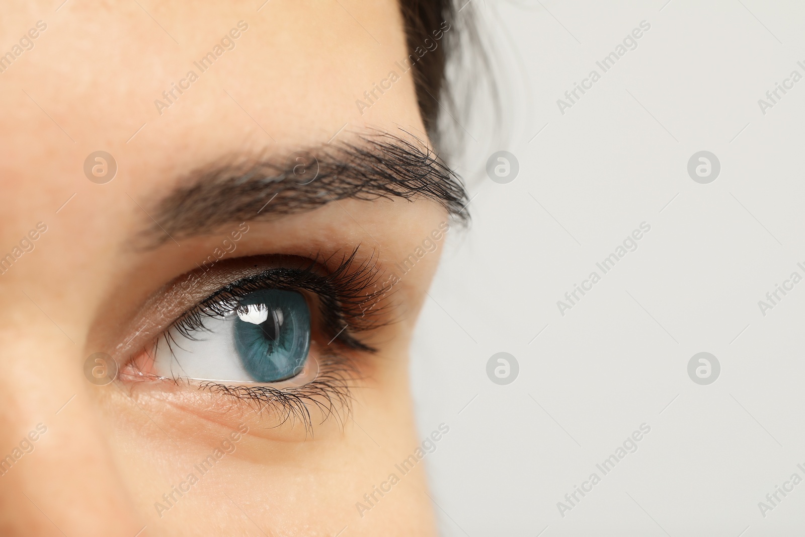 Image of Closeup view of woman with blue eyes