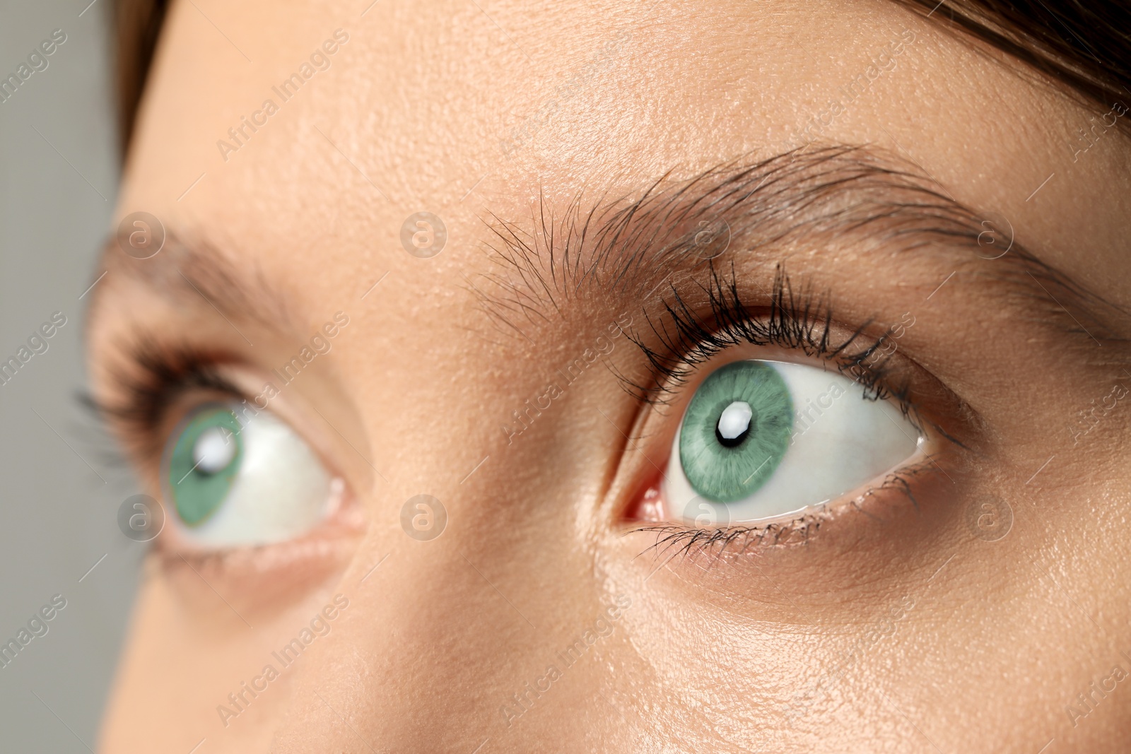 Image of Closeup view of woman with green eyes