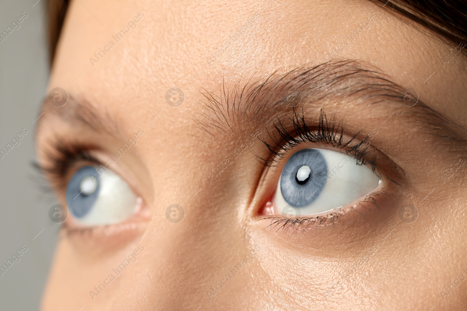 Image of Closeup view of woman with blue eyes