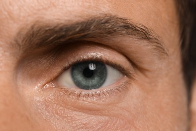 Image of Closeup view of man with blue eyes