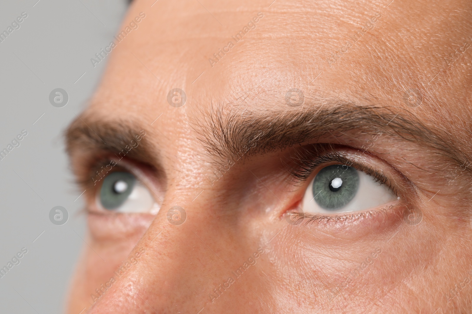 Image of Closeup view of man with blue eyes