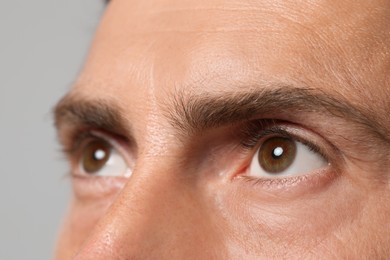 Image of Closeup view of man with brown eyes