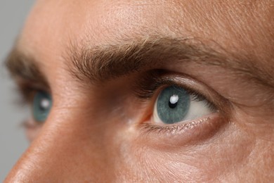 Image of Closeup view of man with blue eyes