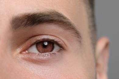 Image of Closeup view of man with brown eyes