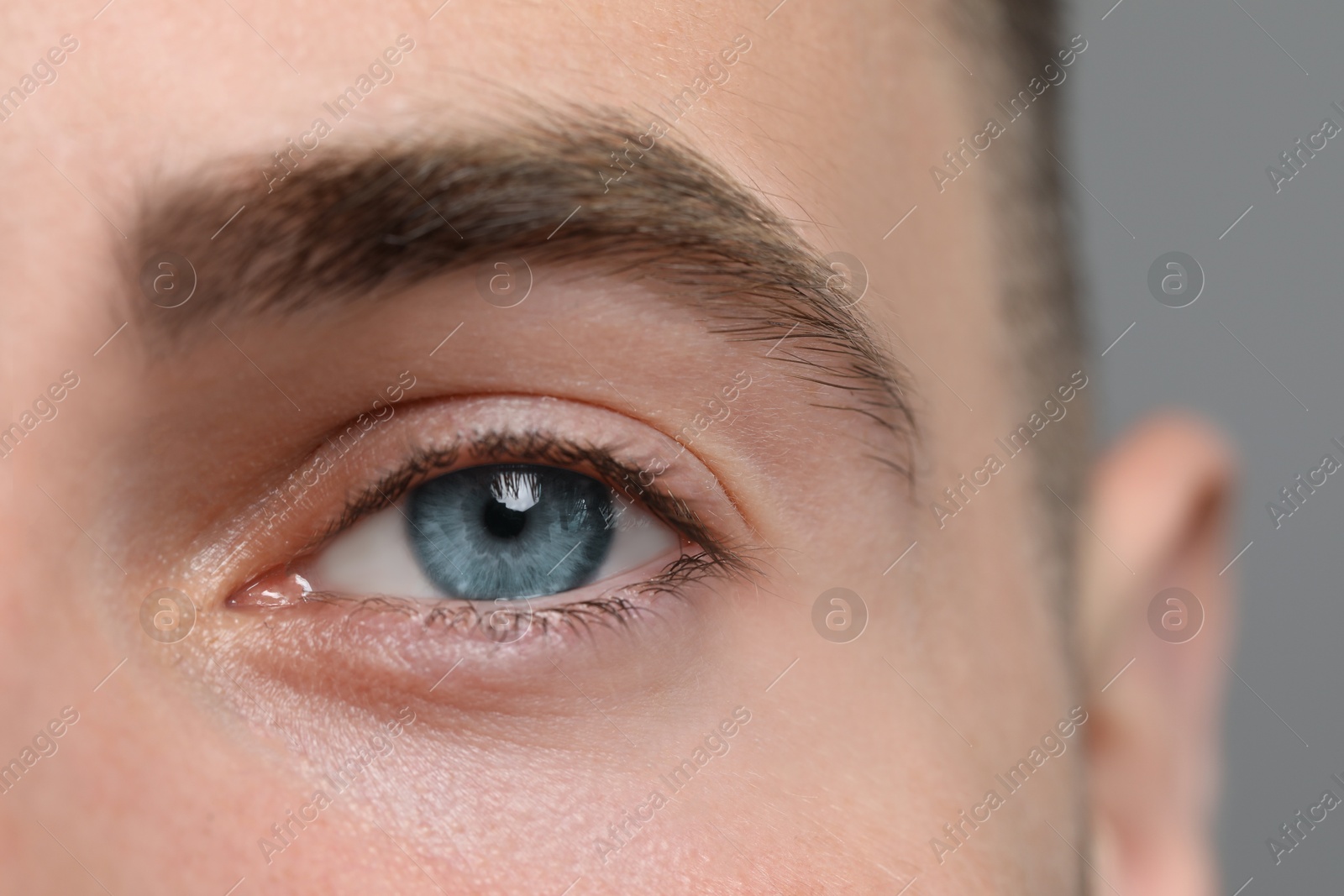 Image of Closeup view of man with blue eyes