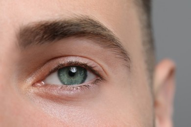 Image of Closeup view of man with green eyes