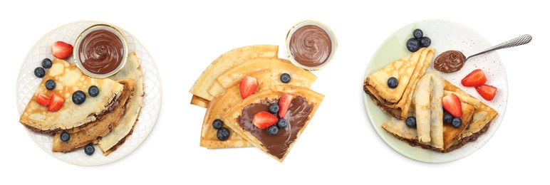 Image of Delicious crepes with chocolate and berries isolated on white, set. Top view