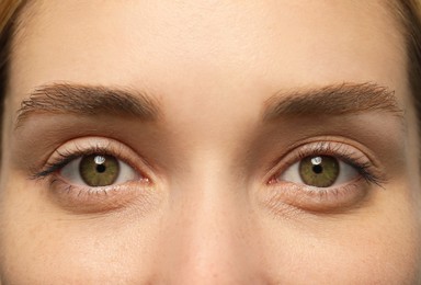 Closeup view of woman with green eyes