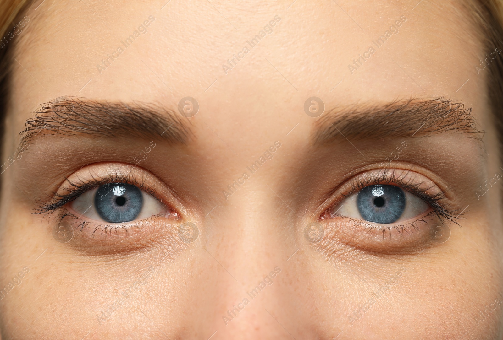 Image of Closeup view of woman with blue eyes