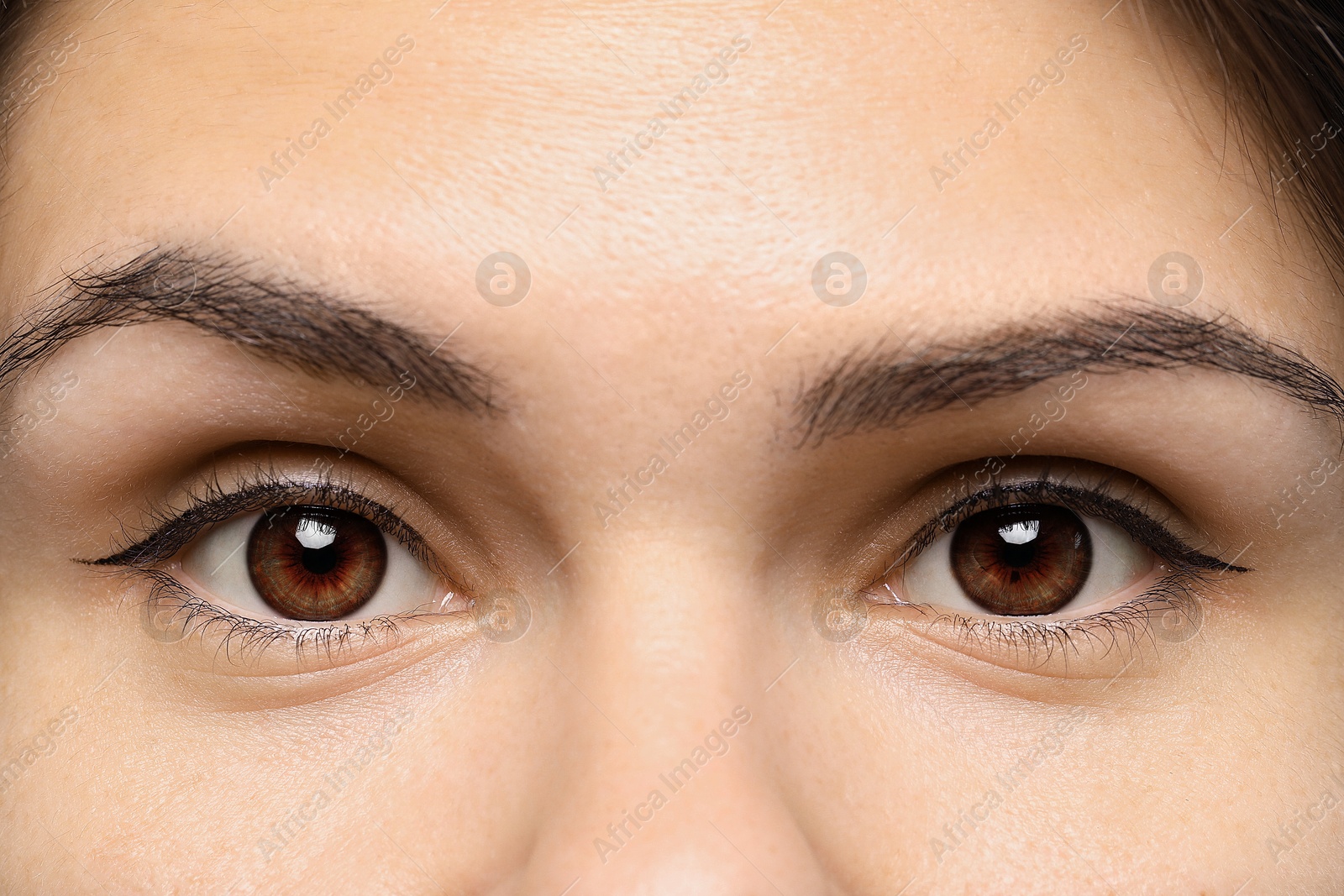 Image of Closeup view of woman with brown eyes