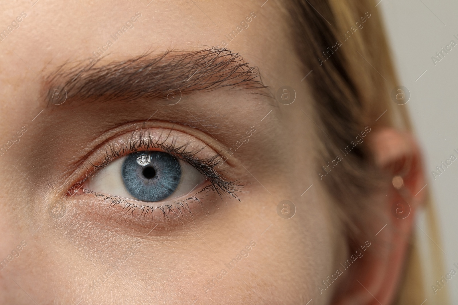 Image of Closeup view of woman with blue eyes