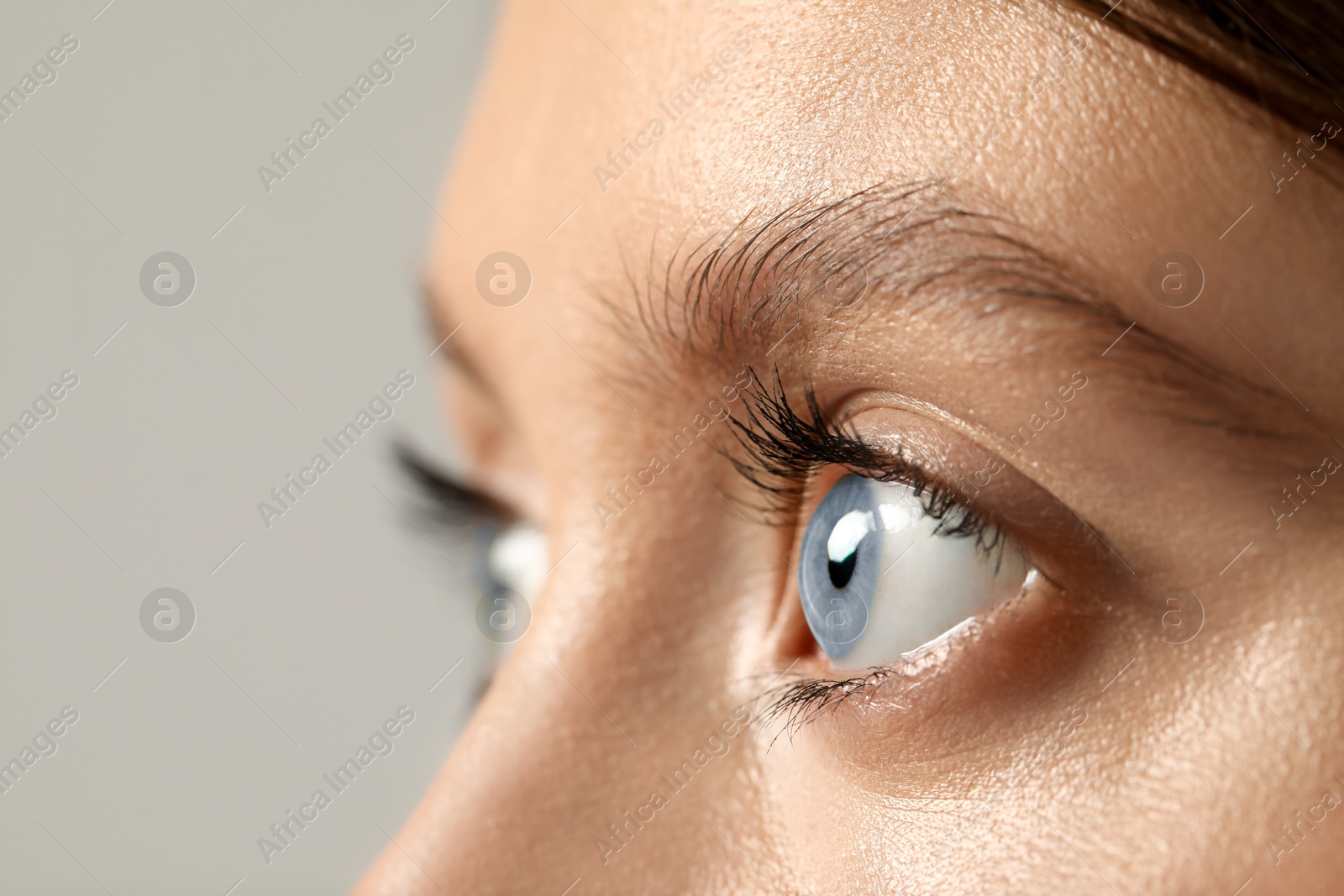 Image of Closeup view of woman with blue eyes