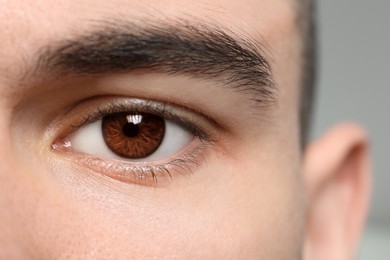 Image of Closeup view of man with brown eyes