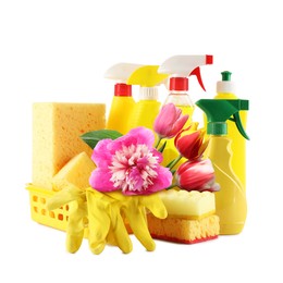 Image of Spring cleaning. Detergents, supplies and flowers on white background