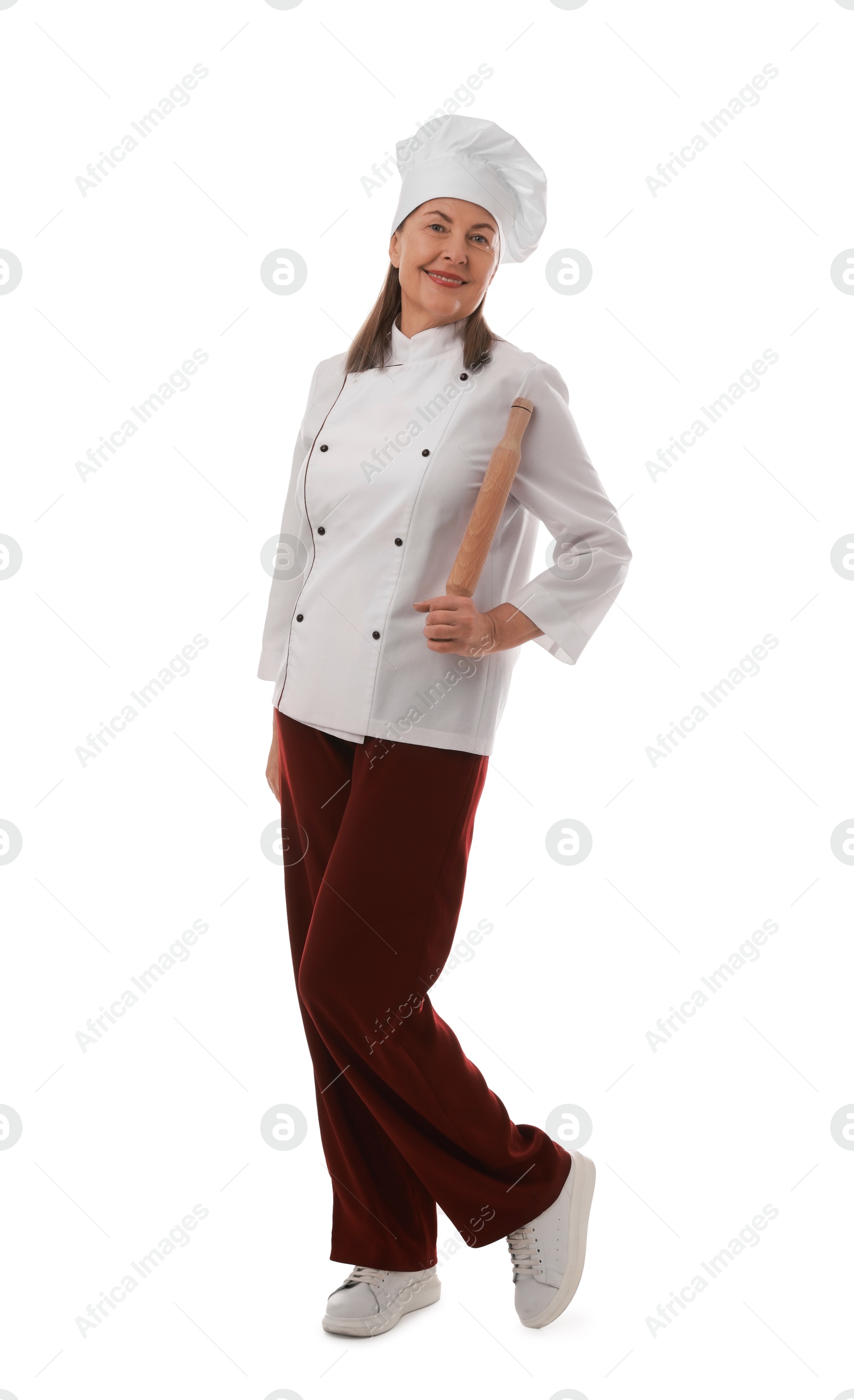 Photo of Happy chef with rolling pin on white background