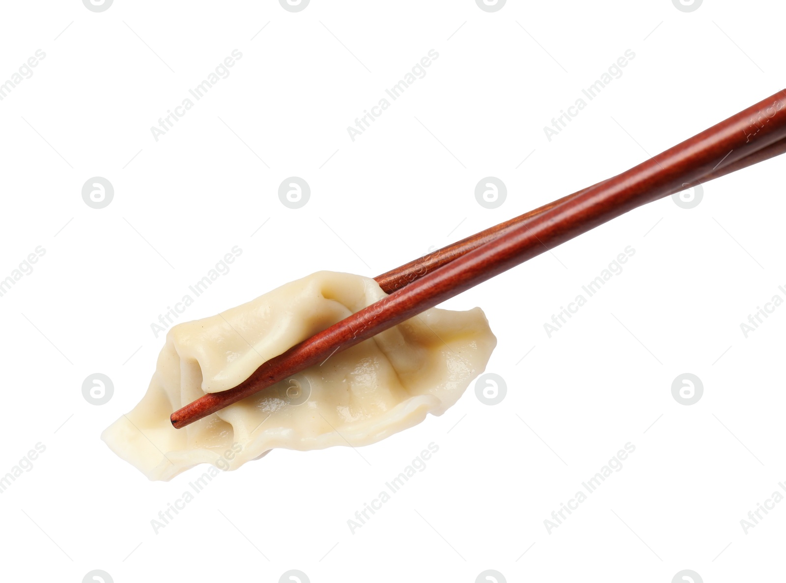 Photo of Chopsticks with fresh gyoza dumpling isolated on white