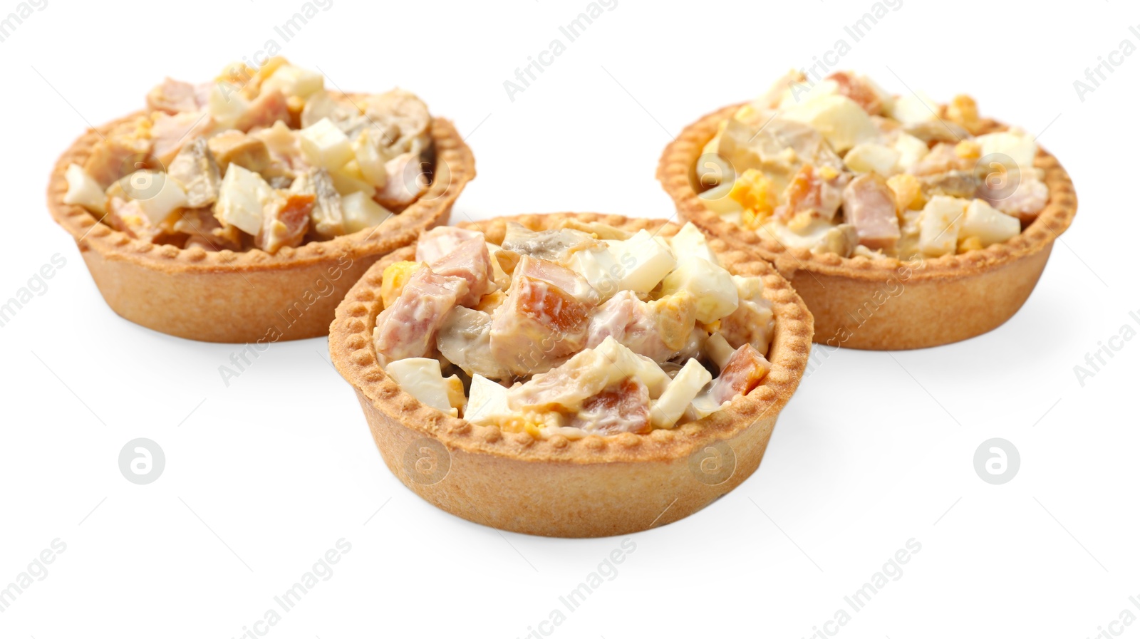 Photo of Tartlets with delicious filling isolated on white